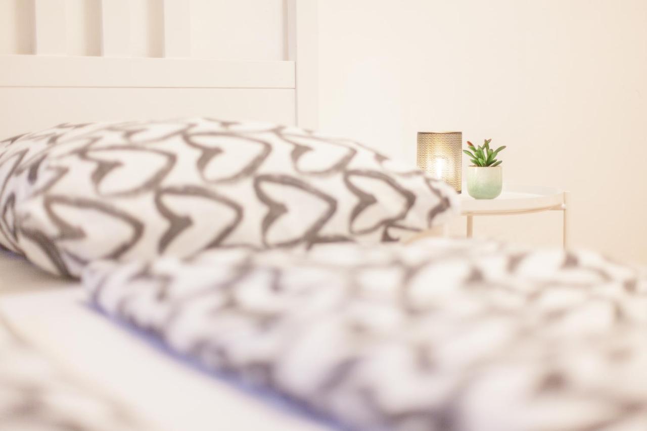 דורטמונד Tm Aparts מראה חיצוני תמונה A bed with a throw
